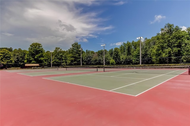 view of tennis court with basketball court