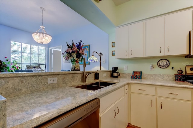 kitchen with dishwasher, sink, hanging light fixtures, light stone counters, and a notable chandelier