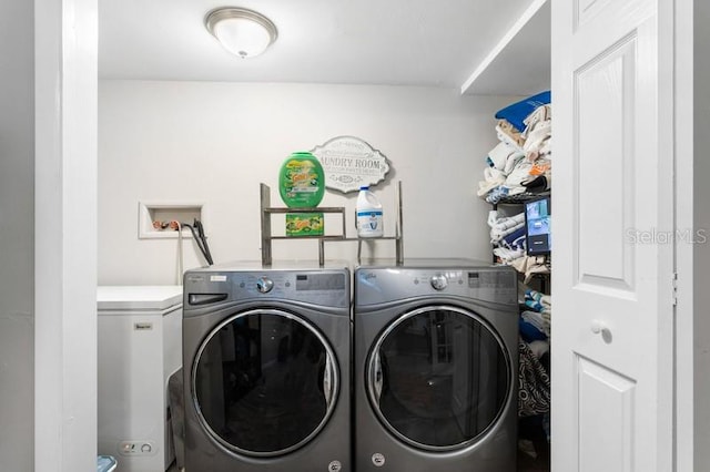 laundry room featuring washing machine and dryer