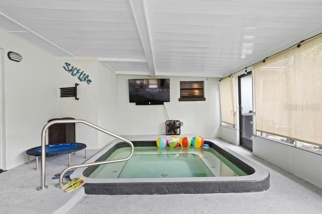 view of pool featuring an indoor in ground hot tub