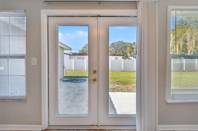 doorway featuring french doors and a wealth of natural light