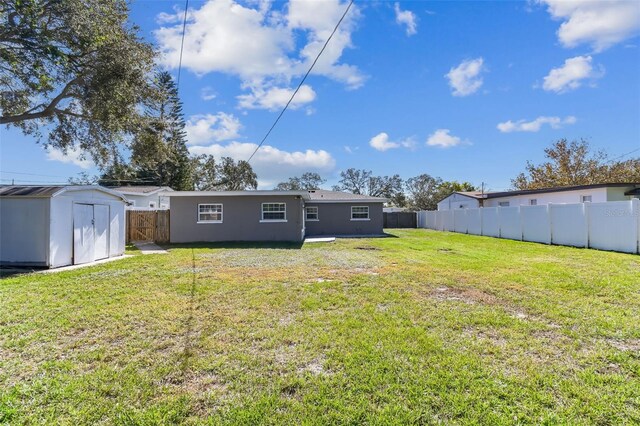 view of yard with a storage shed