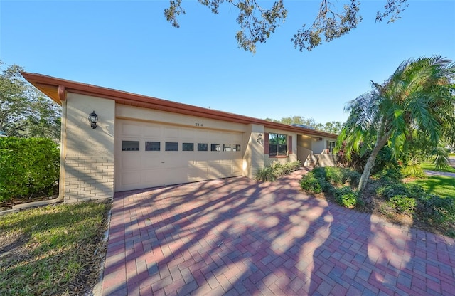 view of front of home featuring a garage