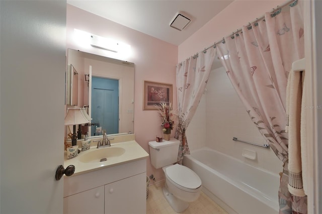 full bathroom with vanity, toilet, and shower / tub combo with curtain