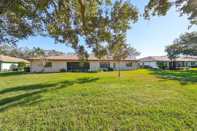 exterior space with a lawn