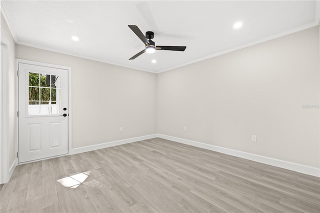 unfurnished room featuring light wood-type flooring, ceiling fan, and ornamental molding