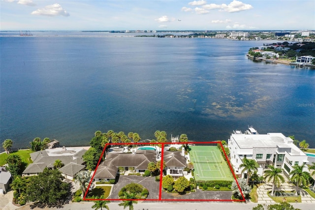 birds eye view of property featuring a water view