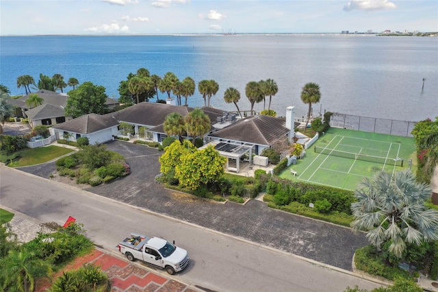 drone / aerial view with a water view