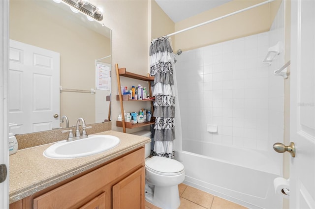 full bathroom with tile patterned floors, vanity, shower / tub combo, and toilet