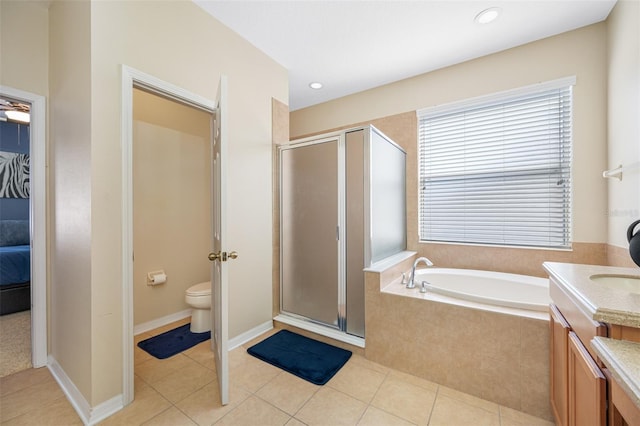 full bathroom with tile patterned floors, vanity, toilet, and plus walk in shower