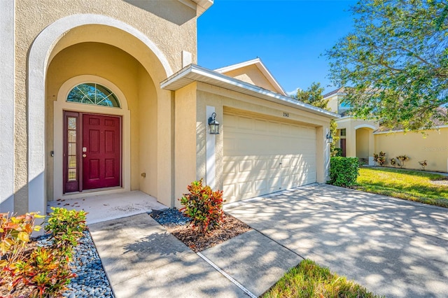 property entrance featuring a garage