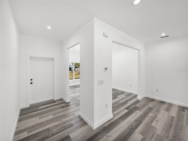 foyer entrance with hardwood / wood-style floors