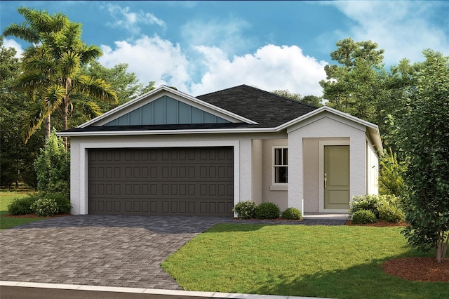 view of front facade with a garage and a front lawn