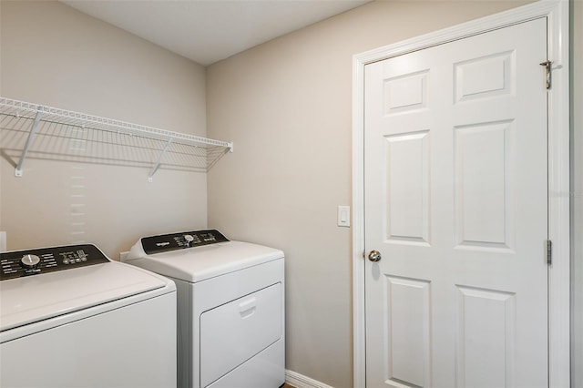 clothes washing area featuring laundry area and independent washer and dryer