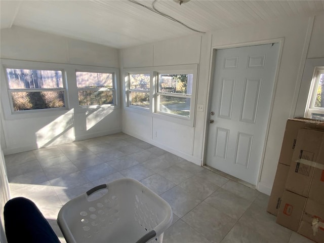 sunroom / solarium featuring plenty of natural light