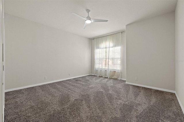 carpeted empty room with ceiling fan