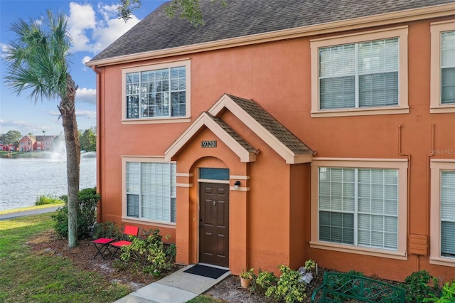 property entrance featuring a water view