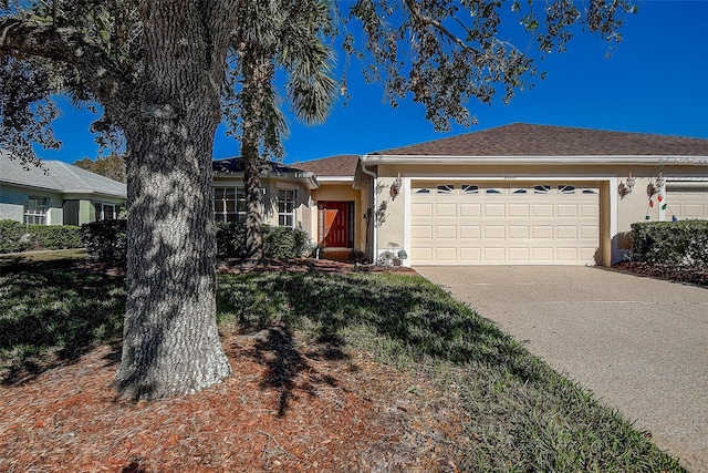 ranch-style home with a garage