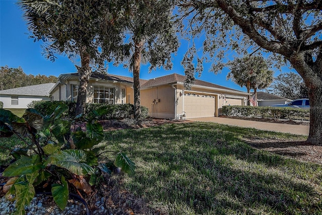 ranch-style home featuring a garage and a front yard