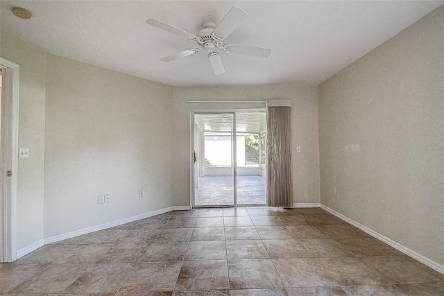 spare room featuring ceiling fan