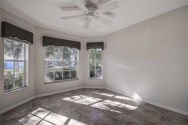 spare room featuring ceiling fan