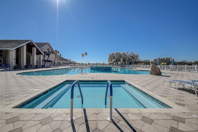 view of pool featuring a patio area