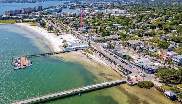 bird's eye view featuring a water view and a view of the beach