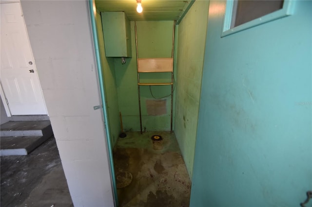 bathroom with concrete flooring