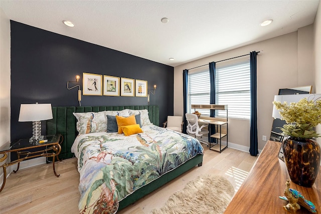 bedroom featuring light hardwood / wood-style flooring