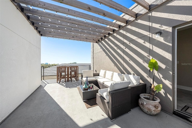 view of patio featuring outdoor lounge area, a balcony, and a pergola