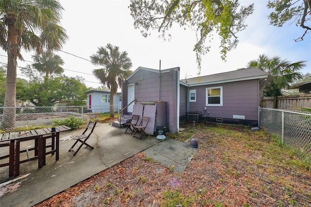 rear view of house with a patio area