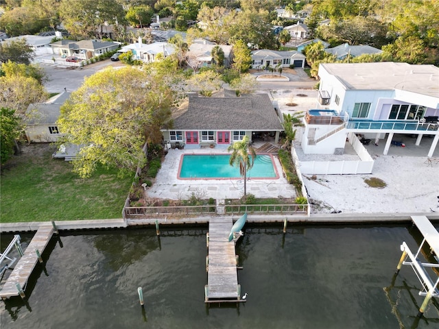 aerial view featuring a water view and a residential view