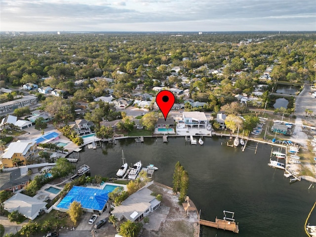 bird's eye view with a water view