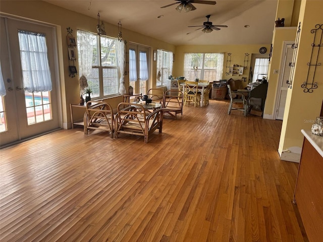 interior space featuring ceiling fan and french doors