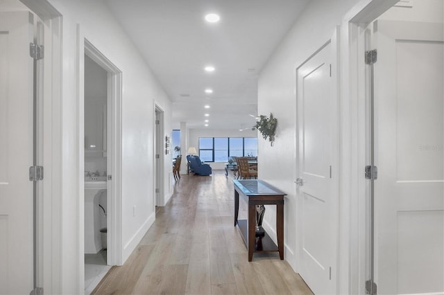 hall featuring light hardwood / wood-style flooring