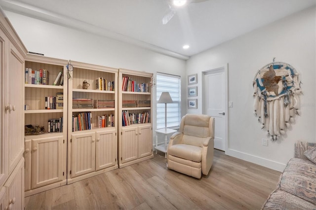 sitting room with light hardwood / wood-style floors