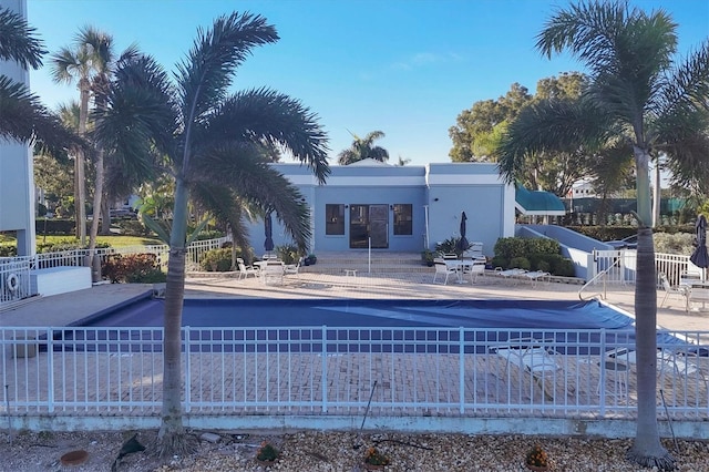 exterior space featuring a patio and a community pool