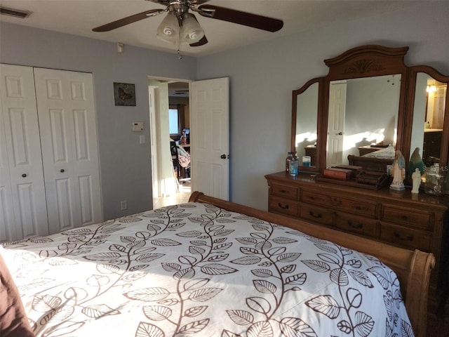 bedroom featuring ceiling fan and a closet