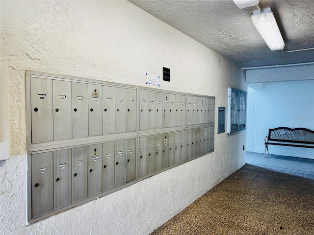 view of community featuring electric panel and mail boxes