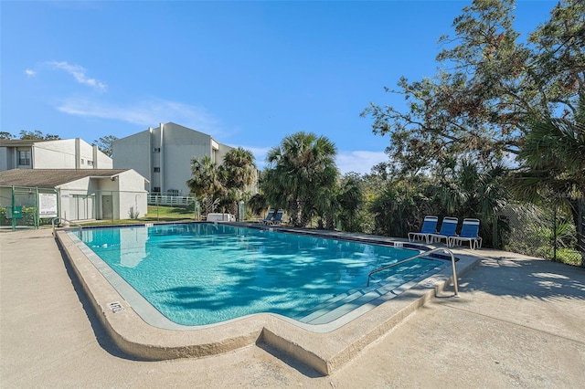 view of pool featuring a patio area