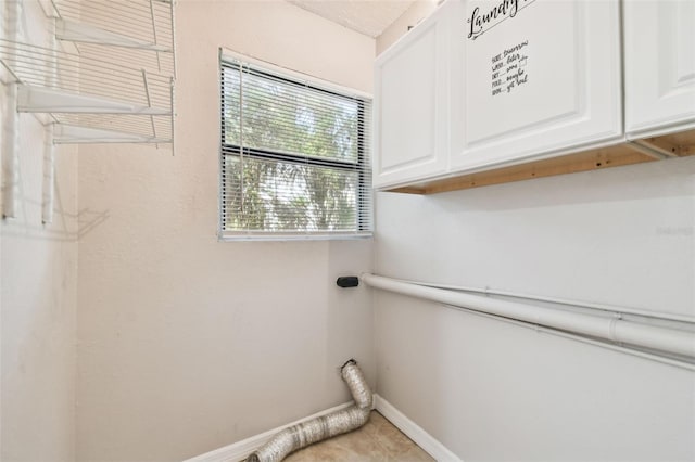 washroom featuring cabinets