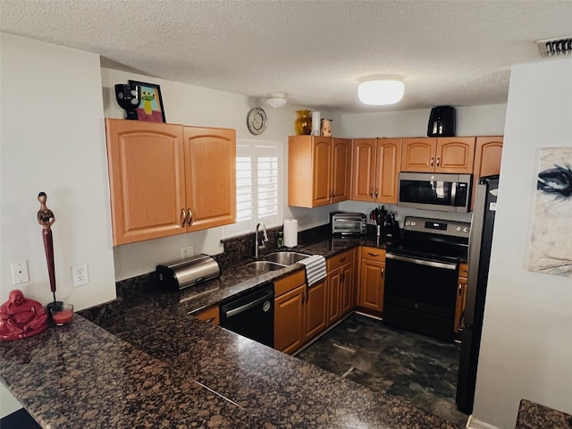 kitchen featuring electric stove, dishwasher, kitchen peninsula, and a textured ceiling