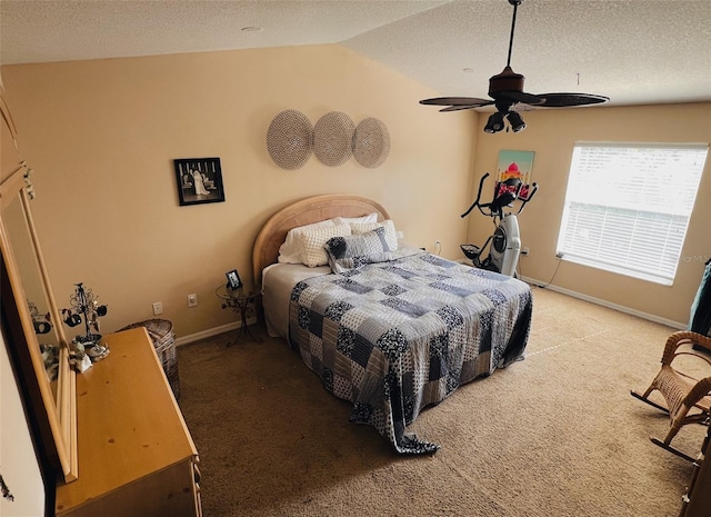 carpeted bedroom featuring vaulted ceiling, a textured ceiling, and ceiling fan