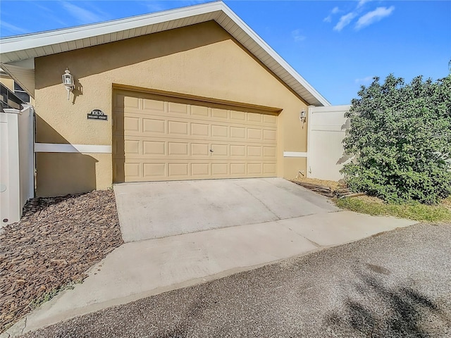 10130 Balcony St, New Port Richey, FL 34655 - garage featuring driveway