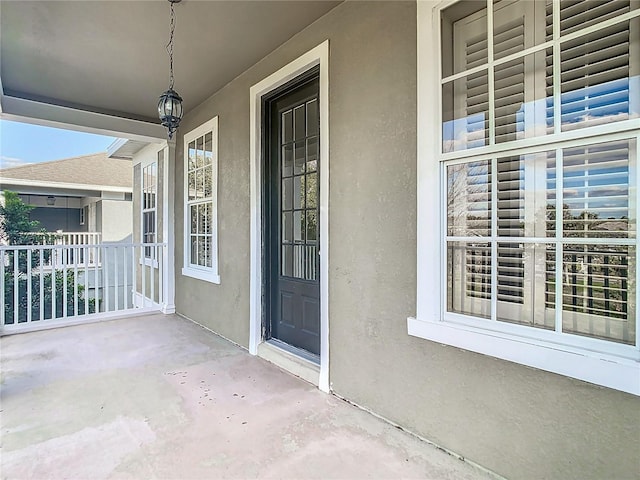 entrance to property with covered porch