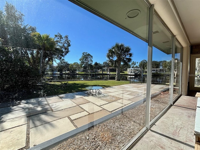 view of patio / terrace with a water view