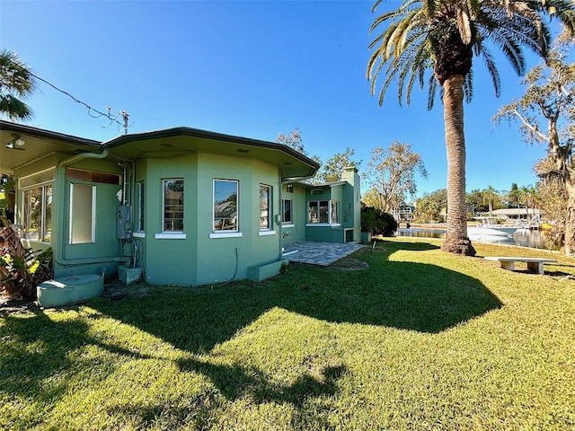 exterior space featuring a lawn