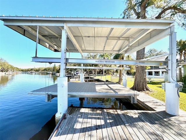 dock area featuring a water view