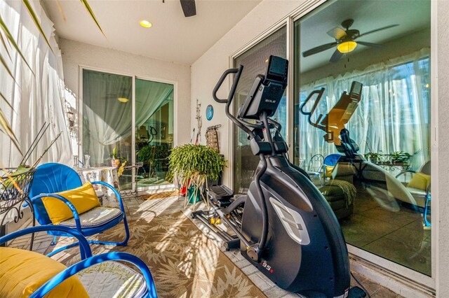 workout area featuring ceiling fan