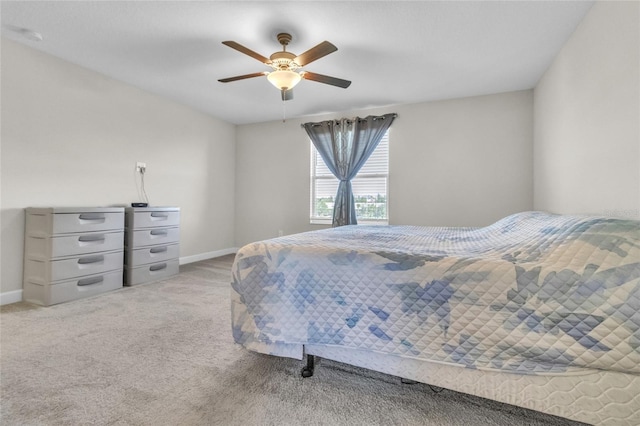 bedroom with light carpet and ceiling fan